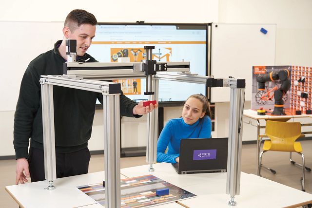A demonstration of a gantry robot performing pick and place tasks